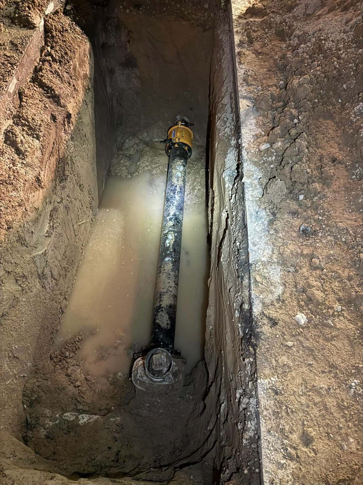 Underground utility trench and pipe installation